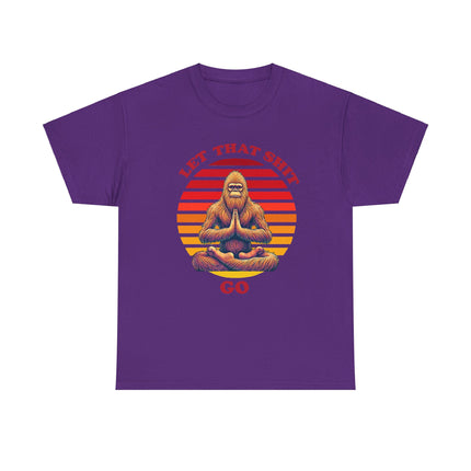 This tee depicts bigfoot sitting in front of a broken up circle in which the parts of the circle are in different shades of red, orange and yellow. The words "Let That Shit Go" is written in the same shade as the top part of the circle. This tee is purple