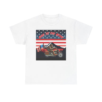 This tee has bigfoot riding on a motorcycle with an American flag hanging off the back. he's riding in front of a mountain that's in front of a patriotic background of stars and stripes. This tee is white