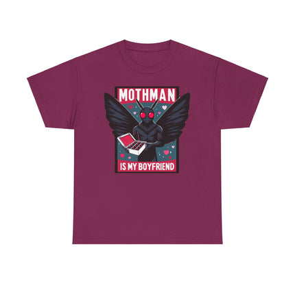 This tee depicts a square picture of Mothman standing between the words "Mothman is my boyfriend" and Mothman is holding a box of chocolates. This tee is maroon