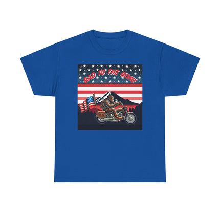 This tee has bigfoot riding on a motorcycle with an American flag hanging off the back. he's riding in front of a mountain that's in front of a patriotic background of stars and stripes. This tee is deep blue