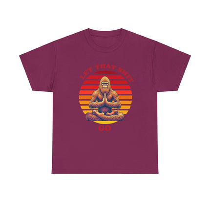 This tee depicts bigfoot sitting in front of a broken up circle in which the parts of the circle are in different shades of red, orange and yellow. The words "Let That Shit Go" is written in the same shade as the top part of the circle. This tee is red