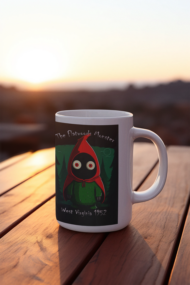 Ceramic mug featuring a whimsical graphic of the Flatwoods Monster, perfect for enjoying your favorite beverages while celebrating cryptid lore.